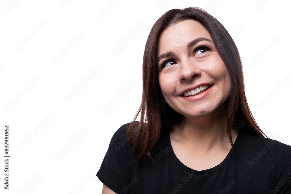 Young beautiful woman with brown eyes wearing a black T-shirt Young beautiful woman with brown eyes wearing a black T-shirt