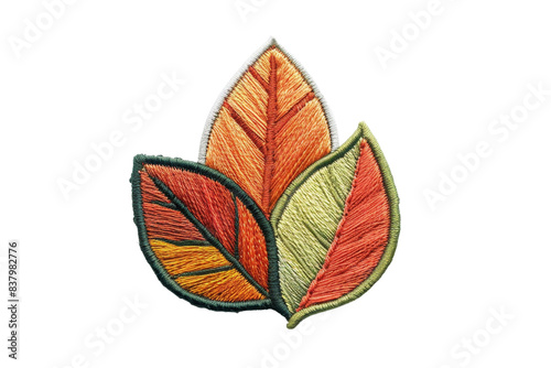 Colorful embroidered leaf design with intricate stitching, perfect for crafts, clothing, and decorative projects. Vector illustration. photo