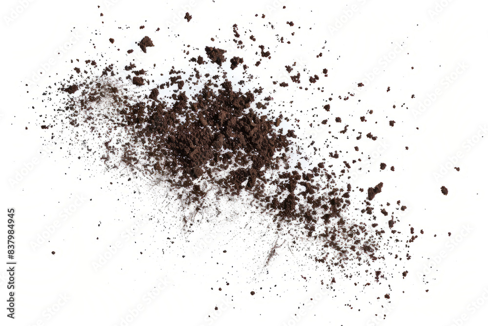 Scattered soil particles forming a starburst pattern in mid-air, set against a white backdrop Scattered soil particles forming a starburst pattern in mid-air, set against a white backdrop