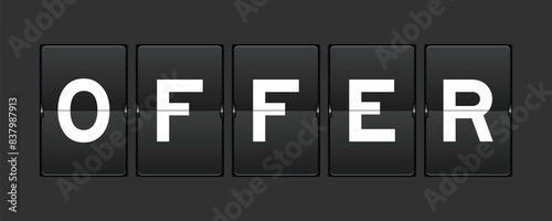 Black color analog flip board with word offer on gray background