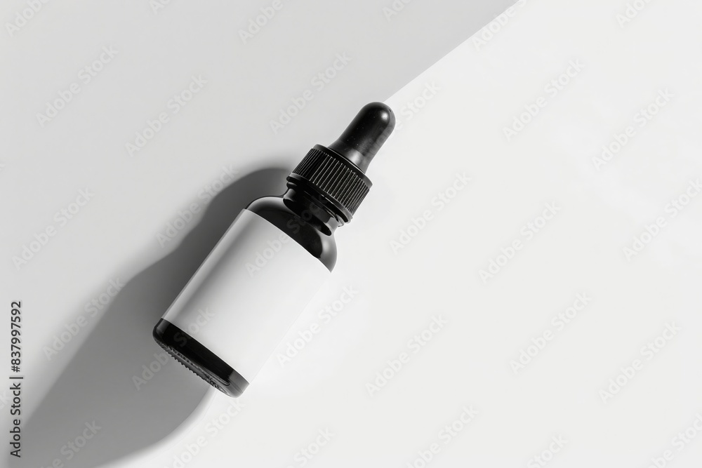 A single, sleek bottle of kojic acid is presented on a white surface, with a clear, empty label ready for branding.