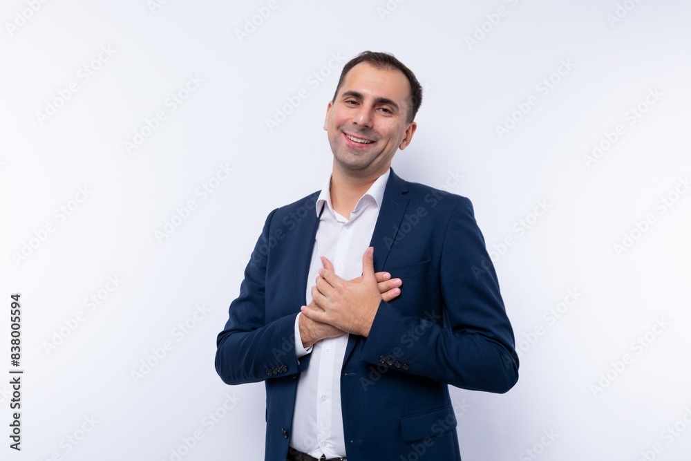 Confident Caucasian man wearing a blue jacket on a white background Confident Caucasian man wearing a blue jacket on a white background