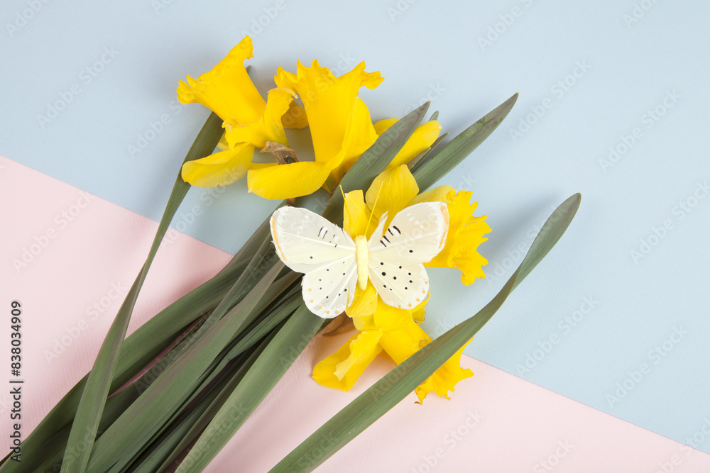 a bouquet of daffodils with a butterfly on it a bouquet of daffodils with a butterfly on it