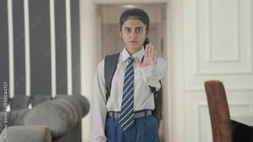 Angry Indian school girl saying No and asking to stop