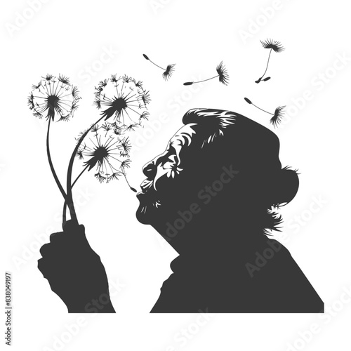 silhouette elderly woman blows dandelion flower black color only