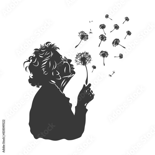 silhouette elderly woman blows dandelion flower black color only