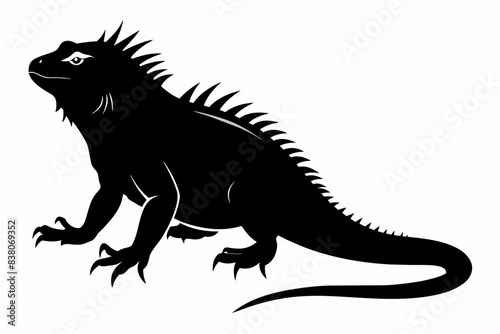 Black silhouette of an iguana isolated on a white background. Concept of reptile illustration, minimalist style, wild animal art. Print, icon, logo, template, pictogram, element for design