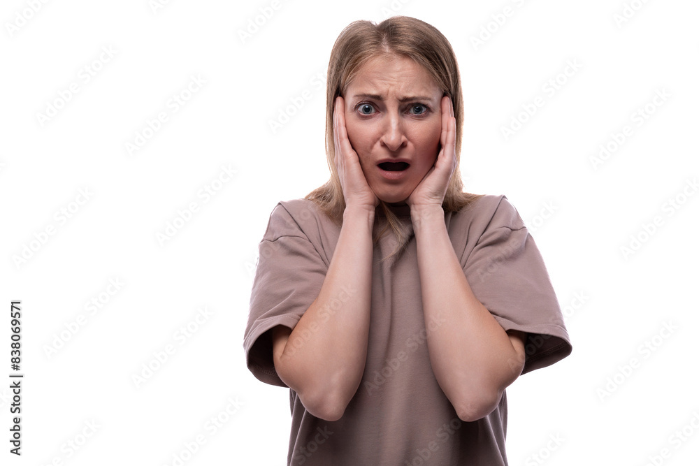 European excited adult woman with blond hair on white background