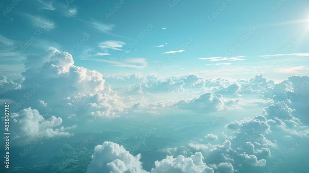 Naklejka premium Breathtaking view of fluffy clouds floating in the vibrant blue sky, bathed in sunlight. Perfect for serene and peaceful backgrounds or nature themes.