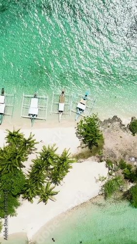 Aerial view of Tropical beach with palm trees. Balidbid Lagoon, Bantayan island, Philippines. photo