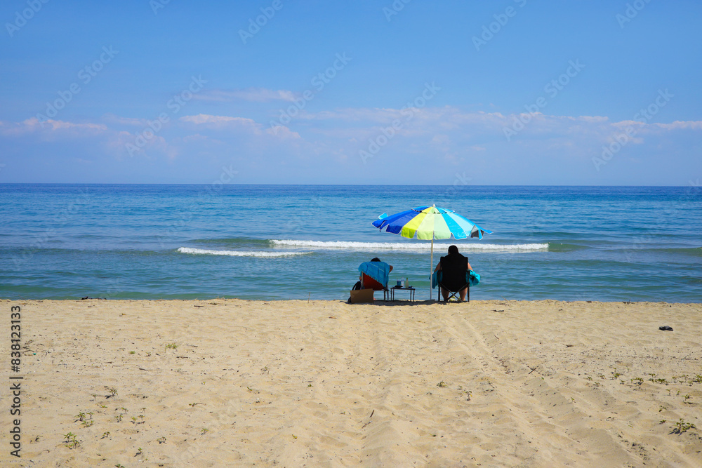 Beach life at the wild sandy beach of Nei Pori, Olympic Riviera - Greece Beach life at the wild sandy beach of Nei Pori, Olympic Riviera - Greece