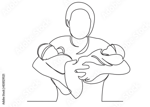 mother with twins on her hands