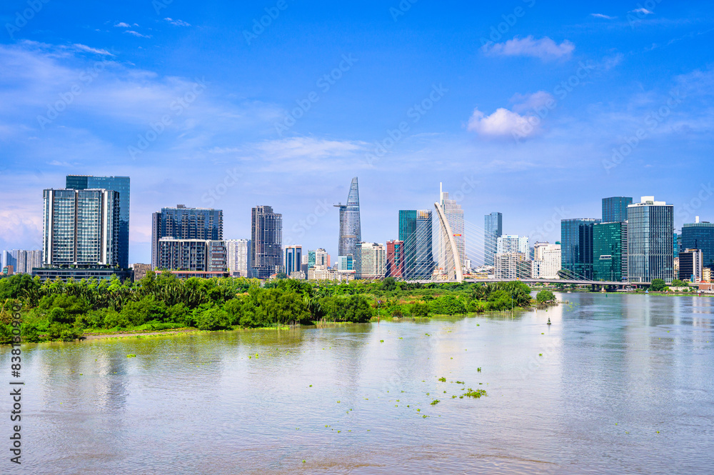 Naklejka premium The landscape of Ho Chi Minh City is located next to the Saigon River. Ho Chi Minh City is the largest economic and regional city in Vietnam