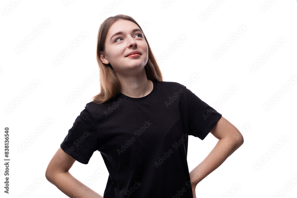 Close-up portrait of a pensive girl with blond hair on a white background