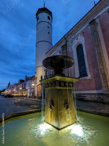 Domazlice historical city center and old town square with white tower,church and medieval gates,Chodsko region,Pilsen,Czech republic,panorama cityscape view photo