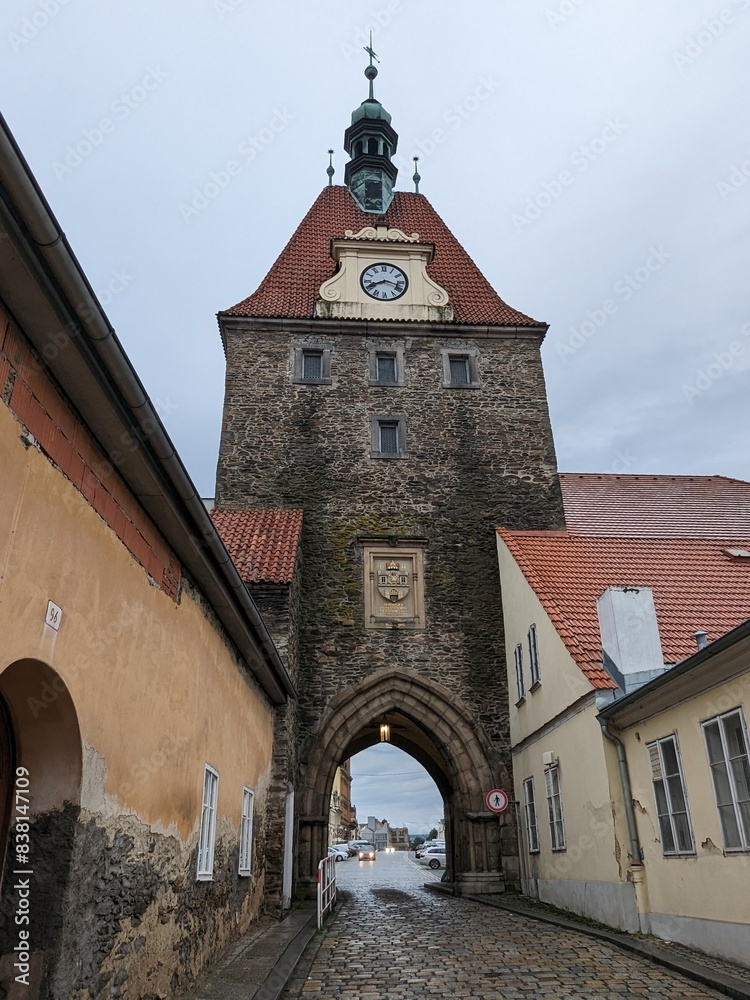 Obraz premium Domazlice historical city center and old town square with white tower,church and medieval gates,Chodsko region,Pilsen,Czech republic,panorama cityscape view