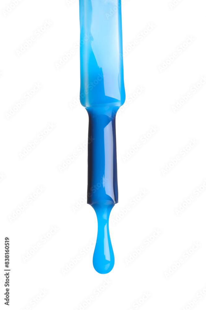 Blue nail polish dripping from brush isolated on white Blue nail polish dripping from brush isolated on white