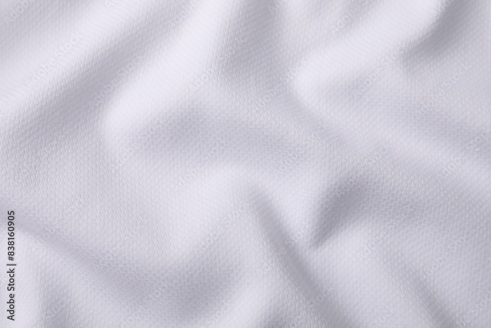 Fototapeta premium Texture of white fabric as background, top view