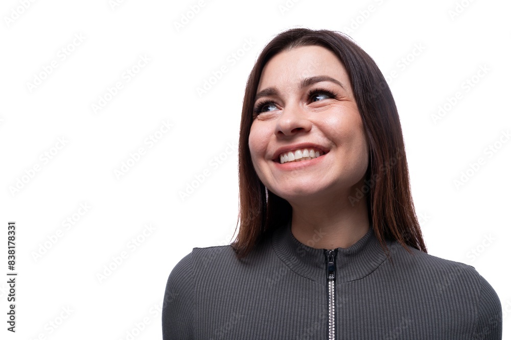 Young inspired woman with black hair isolated on clean white background Young inspired woman with black hair isolated on clean white background