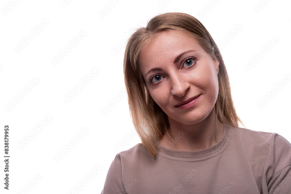 Head portrait of a 40 year old European woman with flowing blonde hair Head portrait of a 40 year old European woman with flowing blonde hair