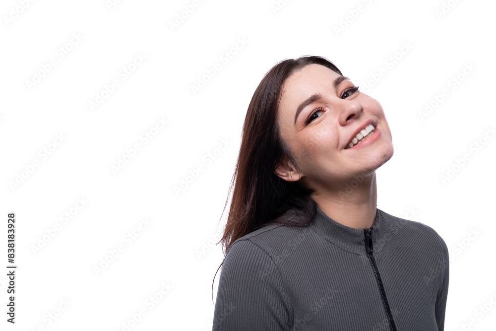 Young inspired woman with black hair isolated on clean white background Young inspired woman with black hair isolated on clean white background