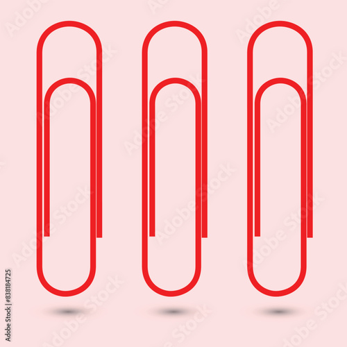 red paper clip isolated on white
