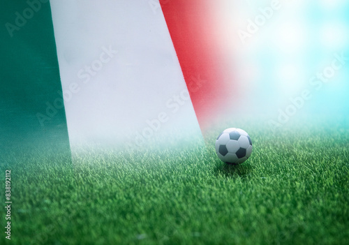 Football Italy nation flag on Green Field , soccer tournament