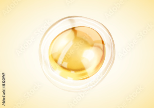 Transparent golden liquid bubble. Golden yellow bubble oil or serum isolated on yellow background. Concept skin care cosmetics solution