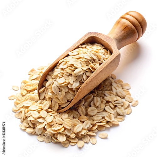 Oatmeal flakes wheat with wooden scoop isolated on a white background.