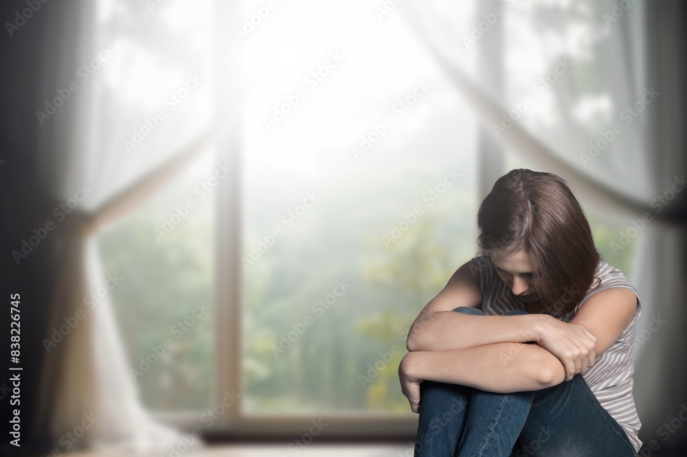 Depressed young woman with problem at home Depressed young woman with problem at home