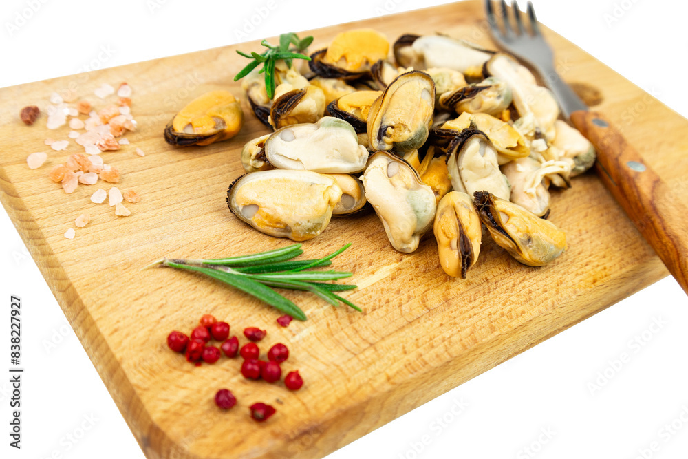 Mussels and herbed spices on cutting board Mussels and herbed spices on cutting board