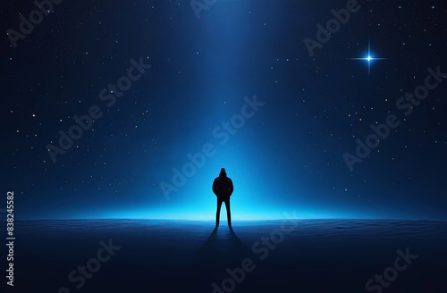 Silhouette of a person in the moonlight. under blue background with some stars.