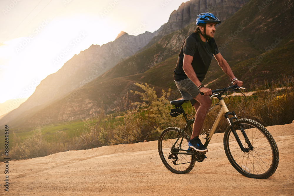 Fototapeta premium Cycling, exercise and man with bicycle on mountain for outdoor journey, adventure or travel in morning. Fitness, cyclist and person with bike in nature for training, wellness and workout in Australia