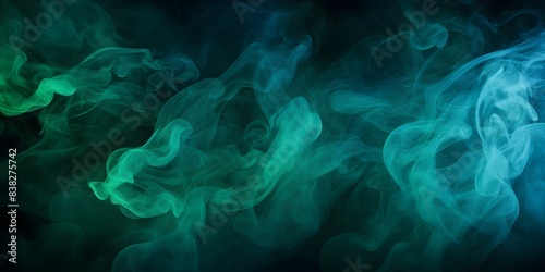 Mysterious green and blue smoke cloud on black background for spooky design. Concept Spooky Design, Mysterious Smoke Cloud, Green and Blue Colors, Black Background