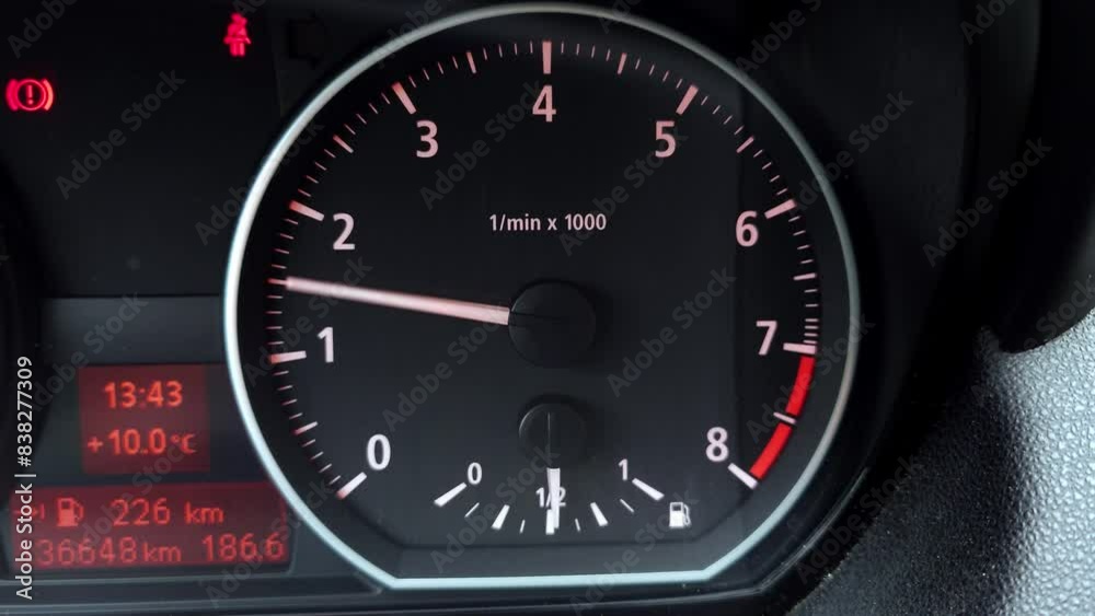 Car rev counter gauge and needle. Revving the engine up to red line limiter. Close up, real time, sound, no people Car rev counter gauge and needle. Revving the engine up to red line limiter. Close up, real time, sound, no people