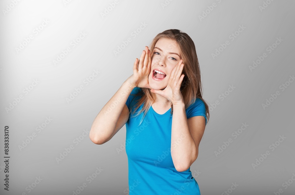 Happy beautiful woman whispering secret gossip. Happy beautiful woman whispering secret gossip.