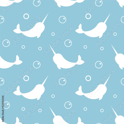 Child  Seamless pattern with white Narwhal and bubbles isolated on light blue background. For textile, fabric, greeting card, invitation.
