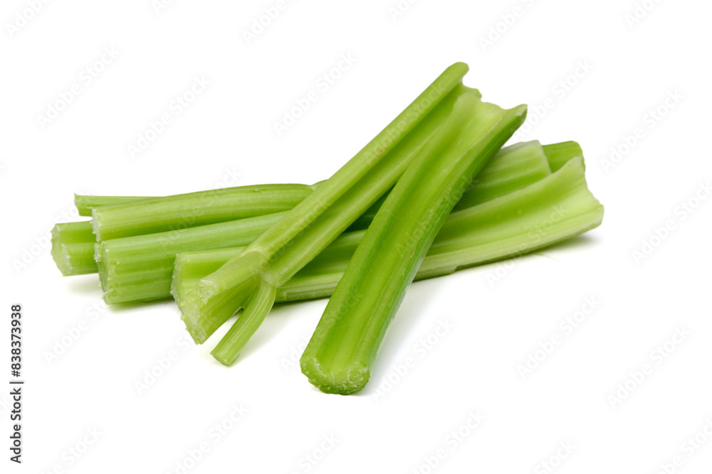 Fresh celery stems on a white background Fresh celery stems on a white background