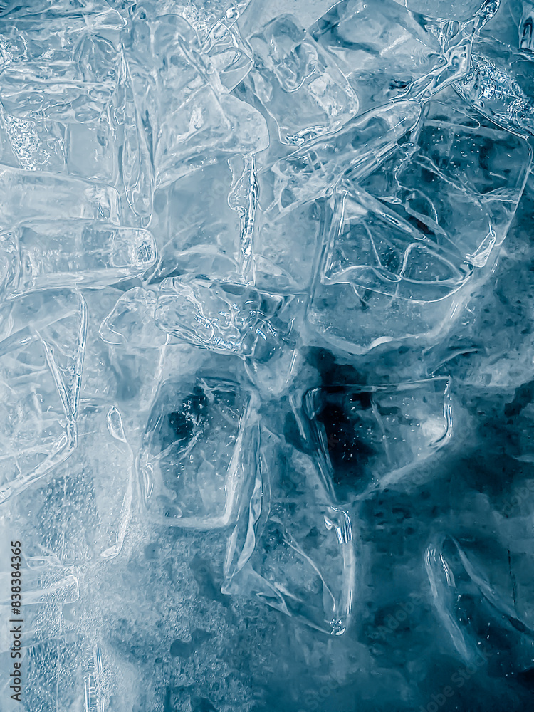 Obraz premium icecubes background,icecubes texture,icecubes wallpaper,ice helps to feel refreshed and cool water from the icecubes helps the water refresh your life and feel good.ice drinks for refreshment business