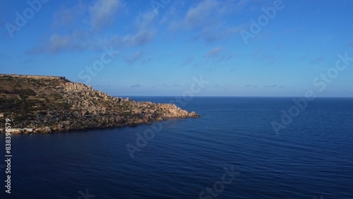 Malta, Gnejna bay aerial view of the sea, horizon and rugged peninsula, Mgar, Maltese island in Mediterranean Sea. High quality photo photo