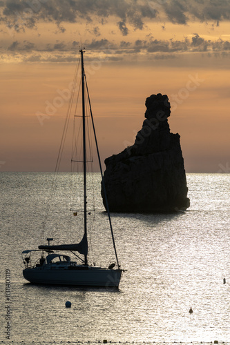 Sunset on Benirras beach in Ibiza in summer photo