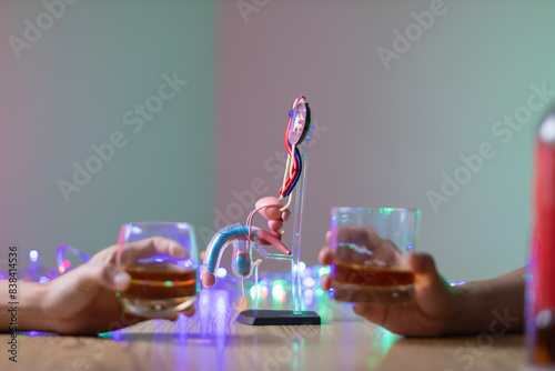 The penis model shows the urinary tract and prostate that are often a problem for men with chronic alcohol addiction and sexual dysfunction, including urinary tract disease and prostate cancer. photo
