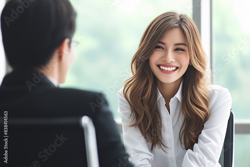 Smiling professional female hr having job interview