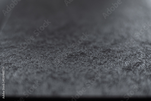Gray plastic board texture, close-up. Cutting board plastic.