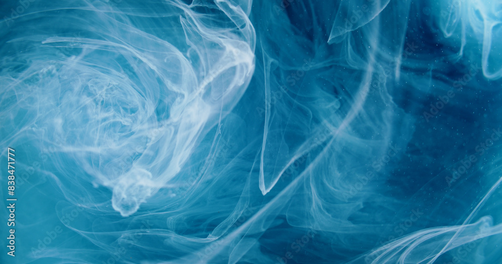 Ink water mix. Blue fog. Defocused dreamlike mist cloud wave dust particles floating paint esoteric abstract art background. Ink water mix. Blue fog. Defocused dreamlike mist cloud wave dust particles floating paint esoteric abstract art background.
