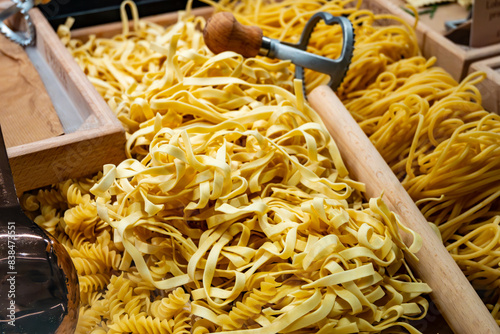 Italian food, fresh homemade pasta tagliatelle ready to cook on Portobello road food market, London