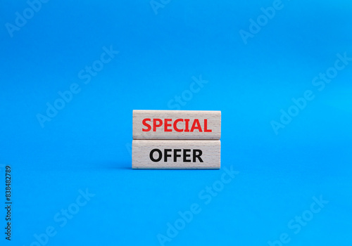 Special offer symbol. Concept word Special offer on wooden blocks. Beautiful blue background. Business and Special offer concept. Copy space