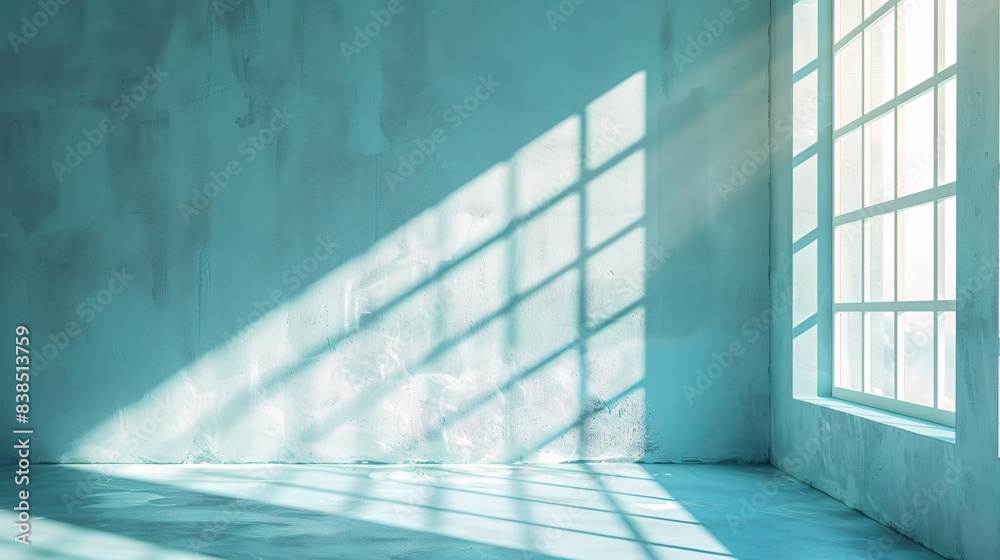 Fototapeta premium Minimal abstract light blue background for product presentation. Shadow and light from windows on plaster wall.