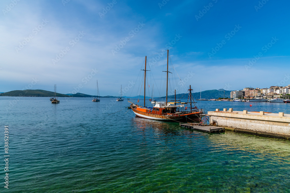 A view from the marina at Sarande, Albania out to sea towards Corfu in the morning in summertime A view from the marina at Sarande, Albania out to sea towards Corfu in the morning in summertime