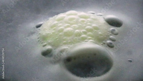 effervescent tablet on a black surface, video